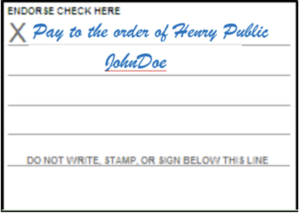 How to Endorse a Check: A Step-By-Step Guide • Benzinga