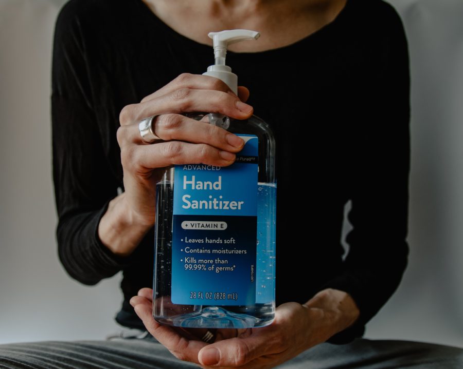 Hand sanitizer bottle - Coronavirus Update: 4 out of 5 Americans Spending Less Money When Social Distancing