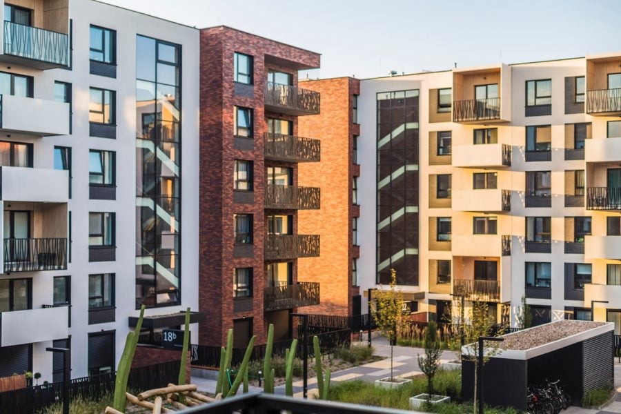 Investing in Multifamily Real Estate Guide • Benzinga